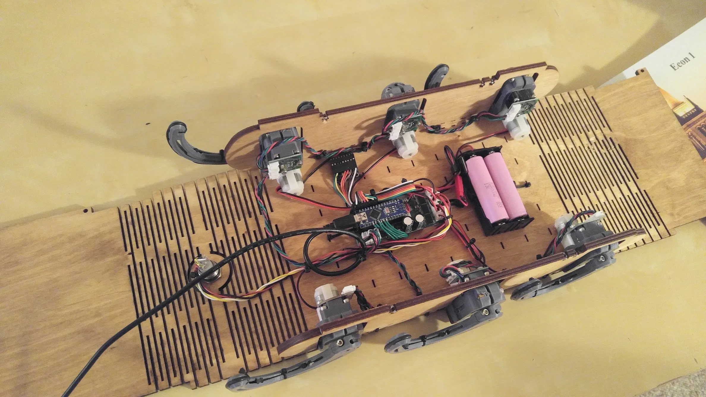 Photo of an opened-up hexapedal robot